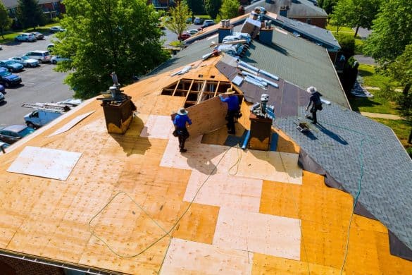 Asphalt Shingle Roof Compared To Metal Roofing On A Home